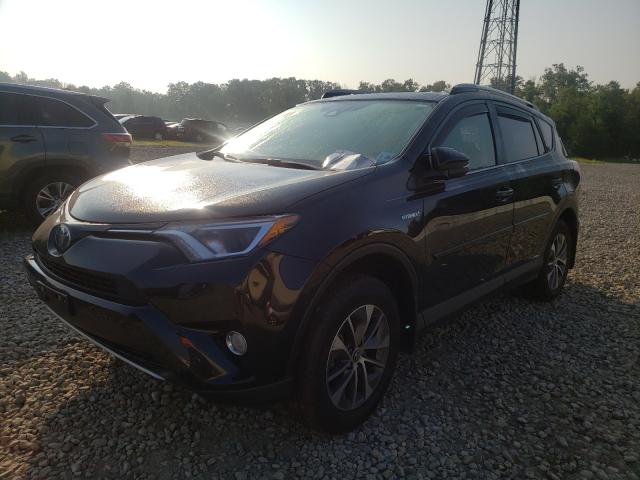 Photo 1 VIN: JTMRJREV3JD244944 - TOYOTA RAV4 HV LE 