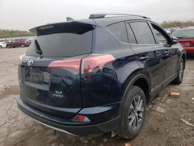 Photo 3 VIN: JTMRJREV3JD255166 - TOYOTA RAV4 HV LE 