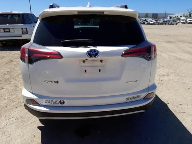 Photo 5 VIN: JTMRJREV3JD255524 - TOYOTA RAV4 HV LE 