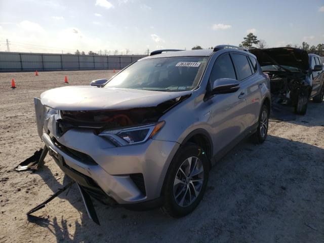 Photo 1 VIN: JTMRJREV3JD256513 - TOYOTA RAV4 HV LE 