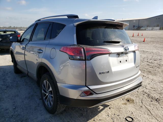 Photo 2 VIN: JTMRJREV3JD256513 - TOYOTA RAV4 HV LE 