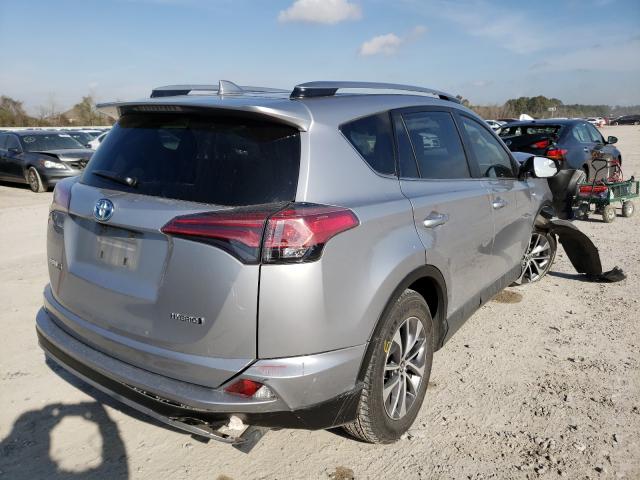 Photo 3 VIN: JTMRJREV3JD256513 - TOYOTA RAV4 HV LE 