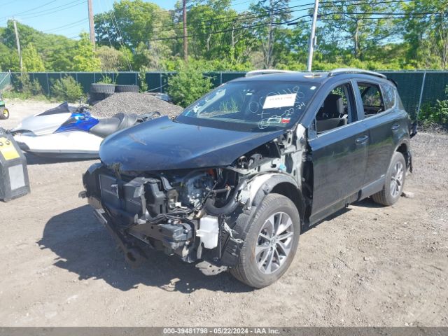 Photo 1 VIN: JTMRJREV3JD258892 - TOYOTA RAV4 HYBRID 