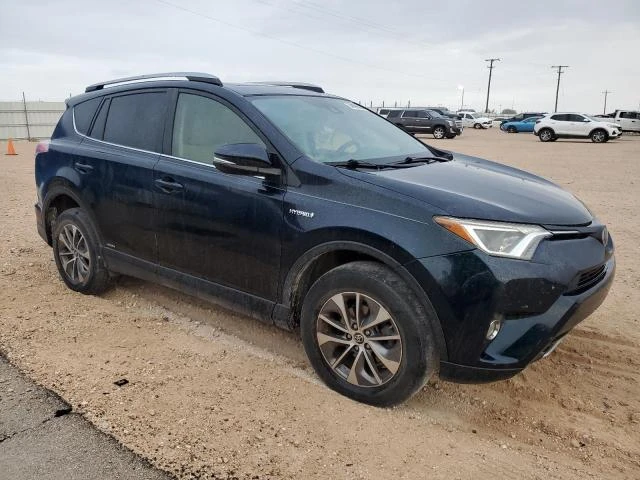 Photo 3 VIN: JTMRJREV4HD139033 - TOYOTA RAV4 HV LE 