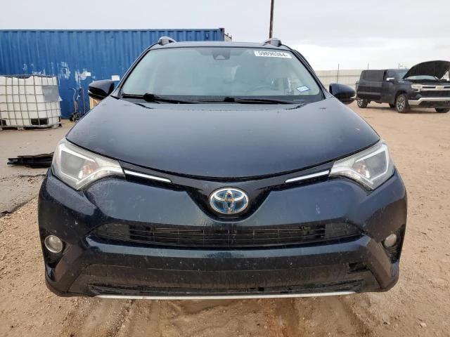 Photo 4 VIN: JTMRJREV4HD139033 - TOYOTA RAV4 HV LE 