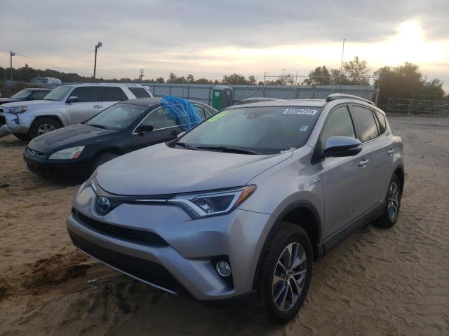 Photo 1 VIN: JTMRJREV4JD172720 - TOYOTA RAV4 HV LE 