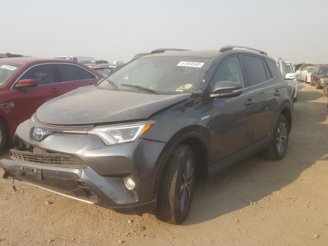 Photo 1 VIN: JTMRJREV4JD181482 - TOYOTA RAV4 HV LE 