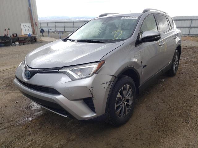 Photo 1 VIN: JTMRJREV4JD195740 - TOYOTA RAV4 HV LE 