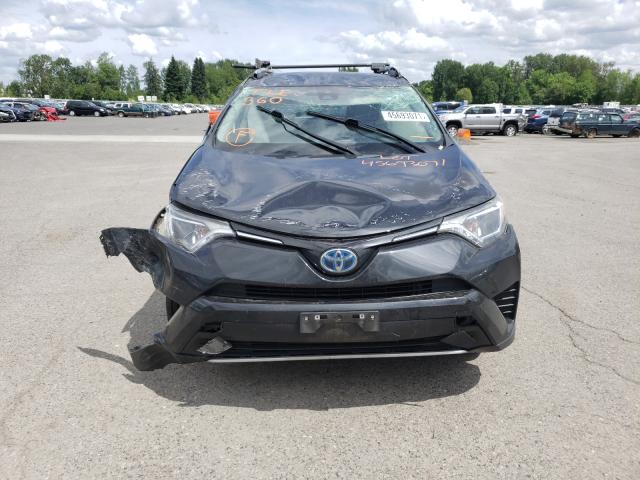 Photo 8 VIN: JTMRJREV4JD208115 - TOYOTA RAV4 HV LE 