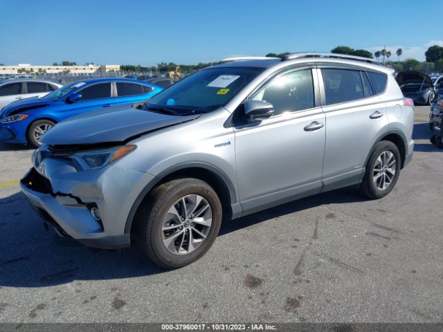 Photo 1 VIN: JTMRJREV4JD216375 - TOYOTA RAV4 HYBRID 