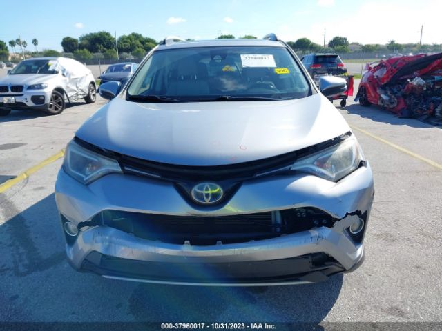 Photo 5 VIN: JTMRJREV4JD216375 - TOYOTA RAV4 HYBRID 