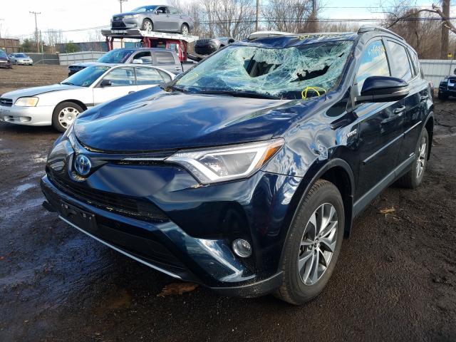 Photo 1 VIN: JTMRJREV4JD217882 - TOYOTA RAV4 HV LE 