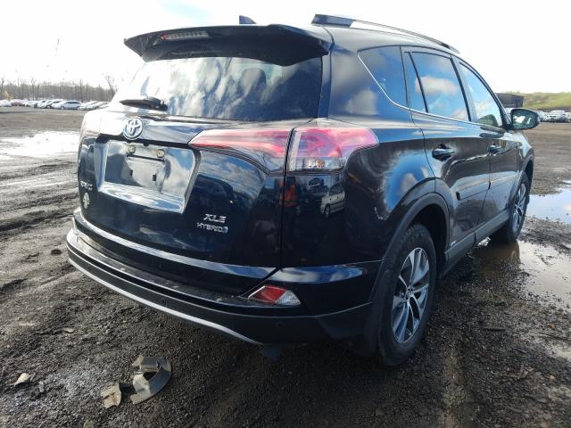 Photo 3 VIN: JTMRJREV4JD217882 - TOYOTA RAV4 HV LE 