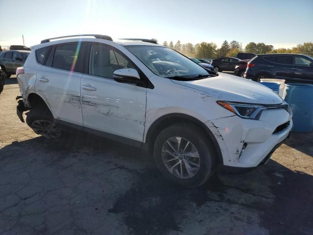 Photo 3 VIN: JTMRJREV4JD259520 - TOYOTA RAV4 HV LE 