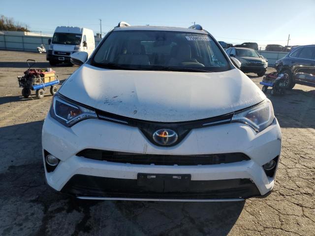 Photo 4 VIN: JTMRJREV4JD259520 - TOYOTA RAV4 HV LE 