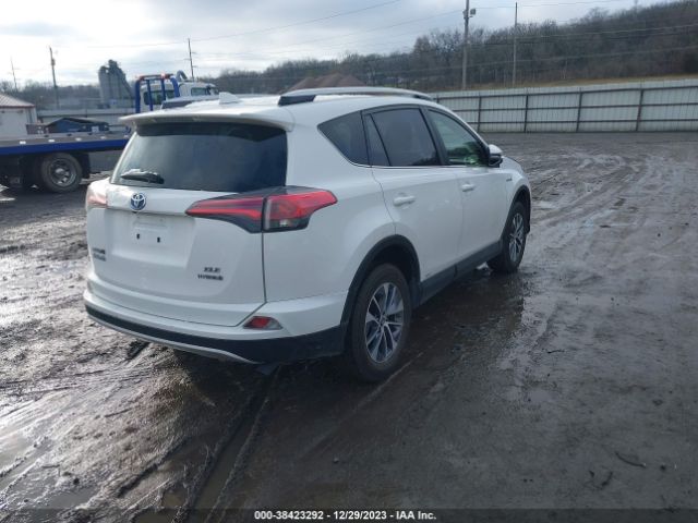 Photo 3 VIN: JTMRJREV5GD016050 - TOYOTA RAV4 HYBRID 