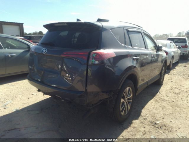 Photo 3 VIN: JTMRJREV5GD016680 - TOYOTA RAV4 HYBRID 