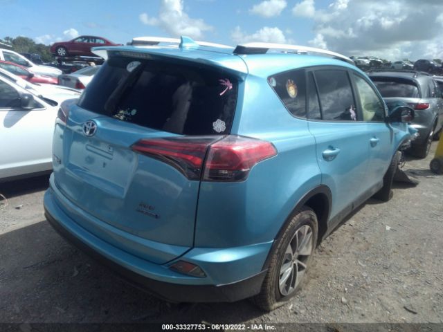 Photo 3 VIN: JTMRJREV5GD019353 - TOYOTA RAV4 HYBRID 