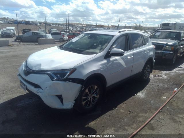 Photo 1 VIN: JTMRJREV5GD042678 - TOYOTA RAV4 HYBRID 