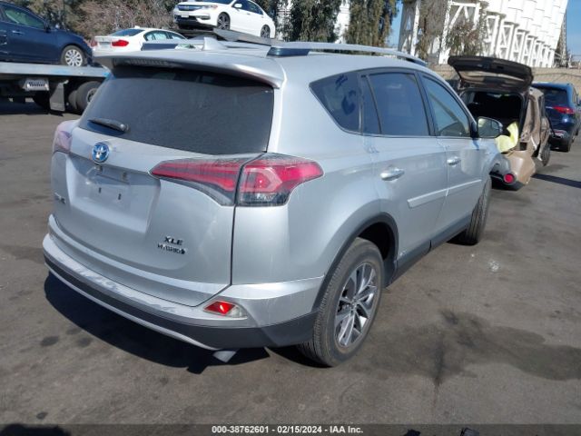 Photo 3 VIN: JTMRJREV5GD049453 - TOYOTA RAV4 HYBRID 