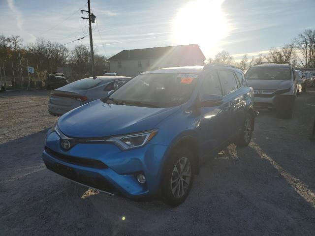 Photo 1 VIN: JTMRJREV5HD074256 - TOYOTA RAV4 HV LE 