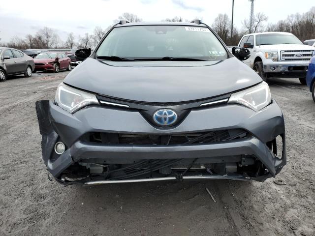 Photo 4 VIN: JTMRJREV5HD088111 - TOYOTA RAV4 HV LE 