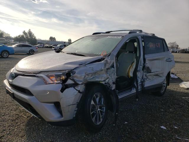 Photo 1 VIN: JTMRJREV5HD095463 - TOYOTA RAV4 HV LE 