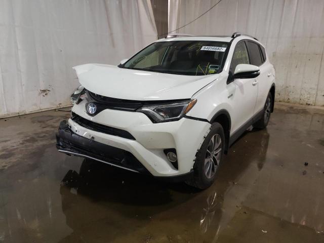 Photo 1 VIN: JTMRJREV5HD098752 - TOYOTA RAV4 HV LE 