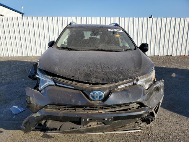 Photo 4 VIN: JTMRJREV5HD131474 - TOYOTA RAV4 HV LE 