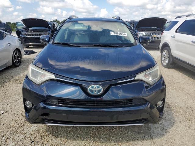 Photo 4 VIN: JTMRJREV5JD156557 - TOYOTA RAV4 HV LE 