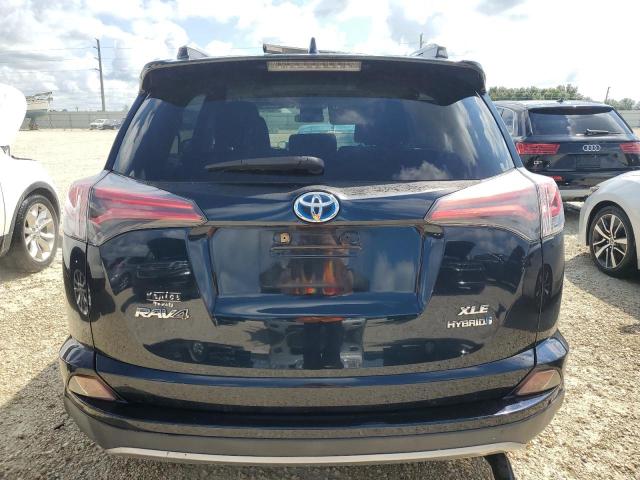 Photo 5 VIN: JTMRJREV5JD156557 - TOYOTA RAV4 HV LE 