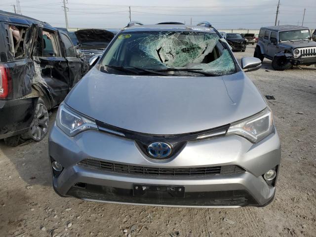 Photo 4 VIN: JTMRJREV5JD175013 - TOYOTA RAV4 HV LE 