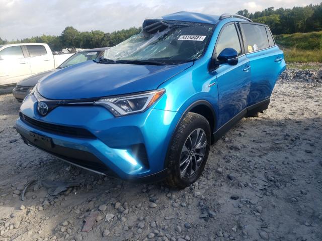 Photo 1 VIN: JTMRJREV5JD203649 - TOYOTA RAV4 HV LE 