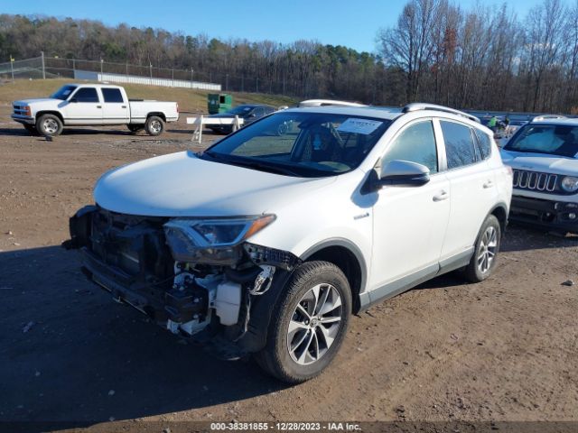 Photo 1 VIN: JTMRJREV5JD213808 - TOYOTA RAV4 HYBRID 