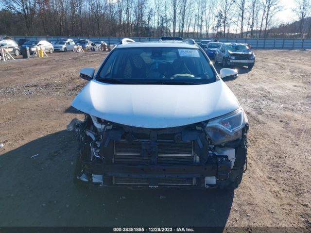 Photo 5 VIN: JTMRJREV5JD213808 - TOYOTA RAV4 HYBRID 