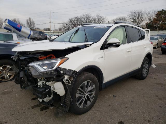 Photo 1 VIN: JTMRJREV5JD222721 - TOYOTA RAV4 HV LE 