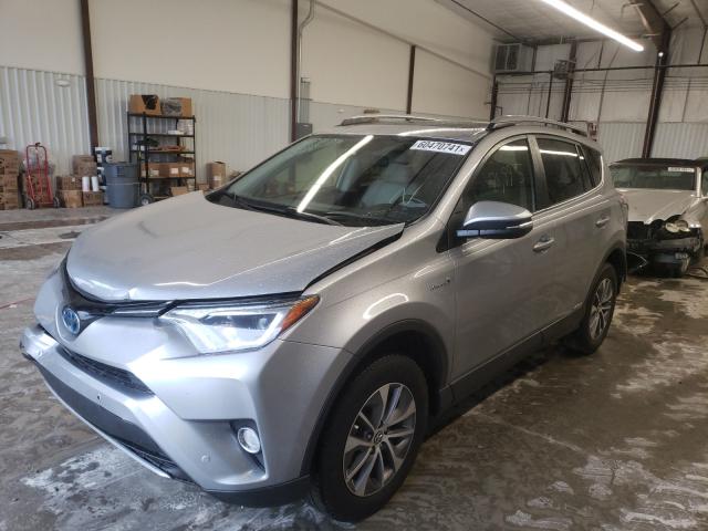 Photo 1 VIN: JTMRJREV5JD236568 - TOYOTA RAV4 HV LE 