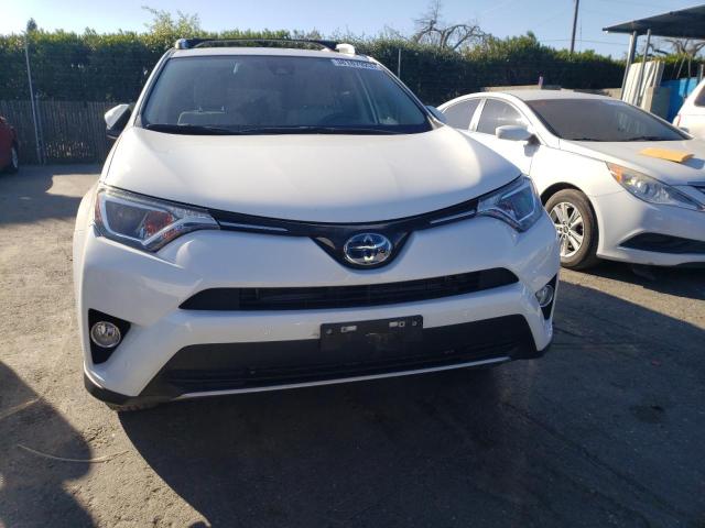 Photo 4 VIN: JTMRJREV5JD254357 - TOYOTA RAV4 HV LE 