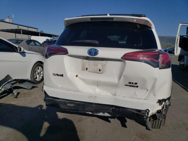 Photo 5 VIN: JTMRJREV5JD254357 - TOYOTA RAV4 HV LE 