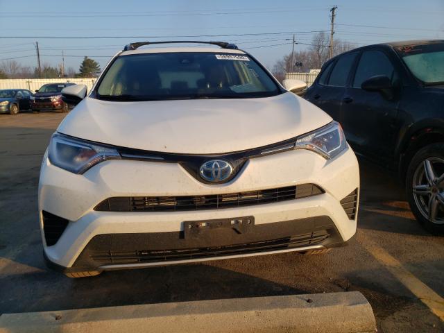 Photo 8 VIN: JTMRJREV5JD255914 - TOYOTA RAV4 HV LE 