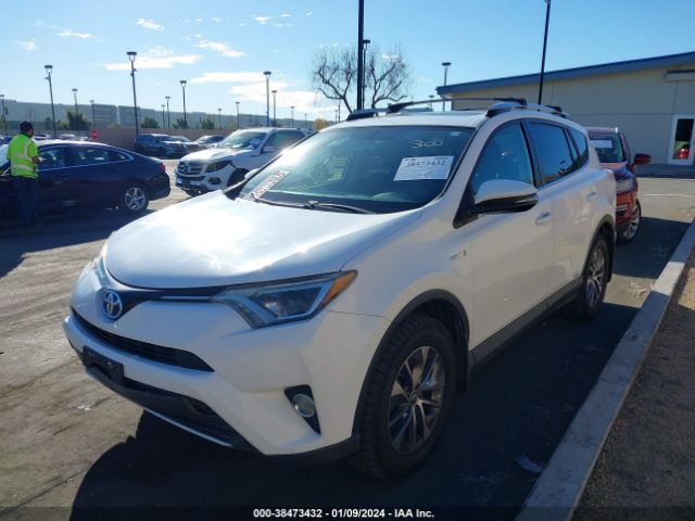 Photo 1 VIN: JTMRJREV6GD001900 - TOYOTA RAV4 HYBRID 