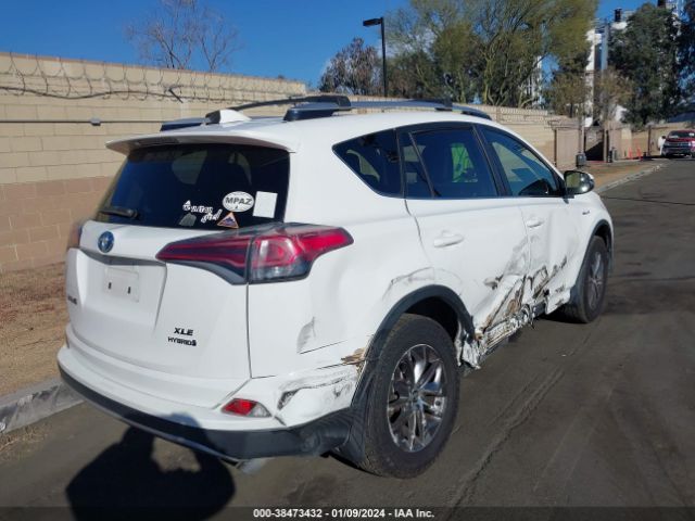 Photo 3 VIN: JTMRJREV6GD001900 - TOYOTA RAV4 HYBRID 