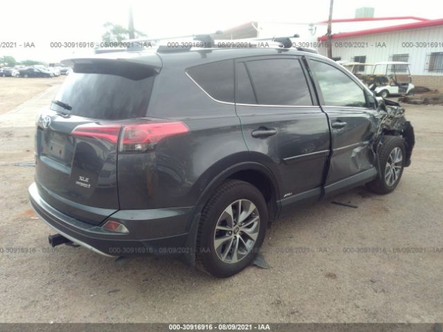 Photo 3 VIN: JTMRJREV6GD003534 - TOYOTA RAV4 HYBRID 