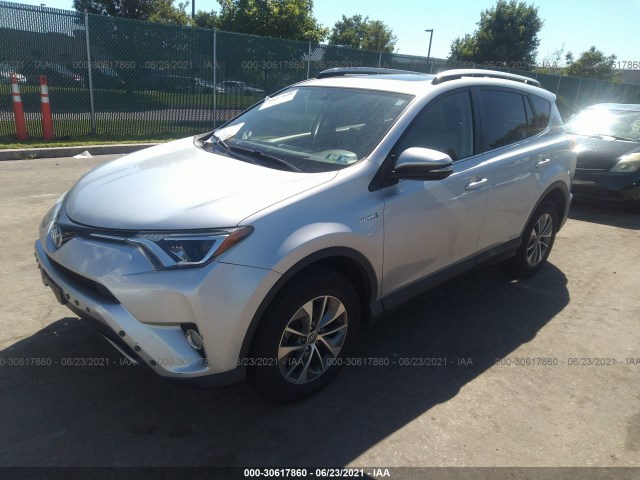 Photo 1 VIN: JTMRJREV6GD011259 - TOYOTA RAV4 HYBRID 