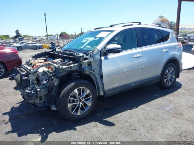 Photo 1 VIN: JTMRJREV6GD043516 - TOYOTA RAV4 