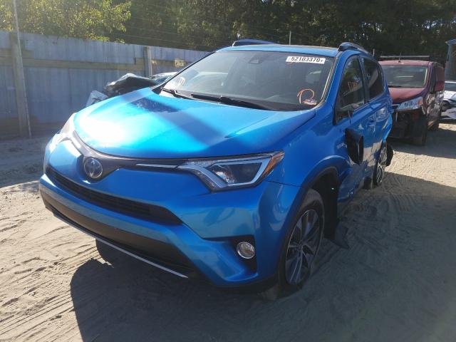 Photo 1 VIN: JTMRJREV6HD070992 - TOYOTA RAV4 HV LE 