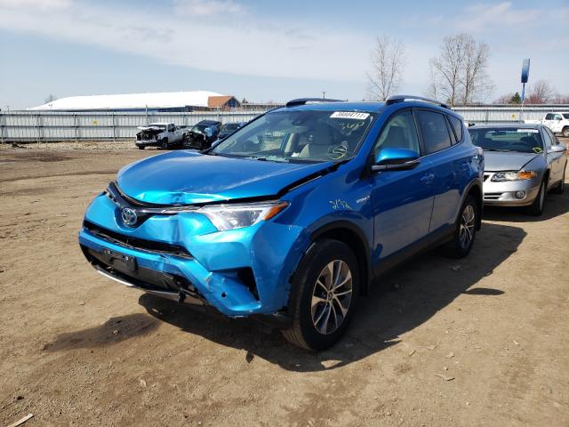 Photo 1 VIN: JTMRJREV6JD176428 - TOYOTA RAV4 HV LE 