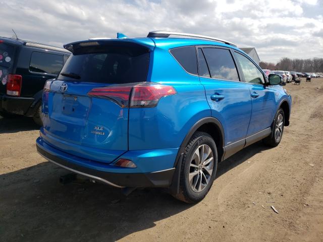 Photo 3 VIN: JTMRJREV6JD176428 - TOYOTA RAV4 HV LE 