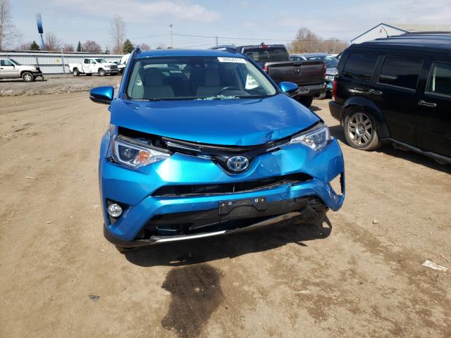 Photo 8 VIN: JTMRJREV6JD176428 - TOYOTA RAV4 HV LE 