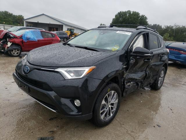 Photo 1 VIN: JTMRJREV6JD184271 - TOYOTA RAV4 HV LE 